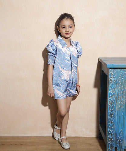 It Consists of a self-printed blue coloured crop top, shorts and a shirt for a little girl.