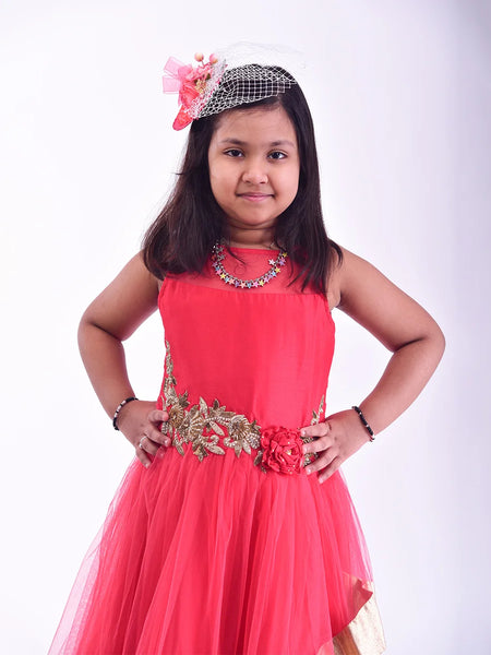  It is a red Colored double-layer party gown that comes with short sleeves that can be stitched as per requirement. It features floral embroidery detailing on the dress that uplifts the entire look.