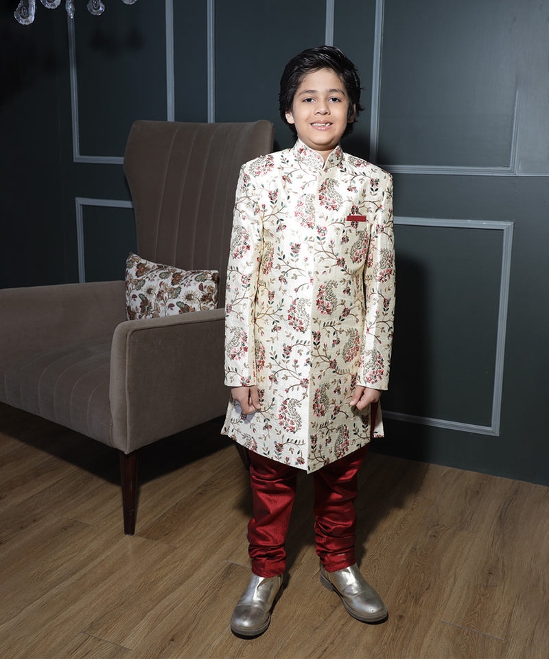 Self-embroidered cream sherwani set with maroon pyjama for boys, Jaipur ethnic fashion