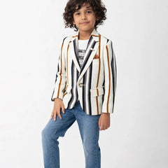 Child wearing a striped blazer and jeans on a white background