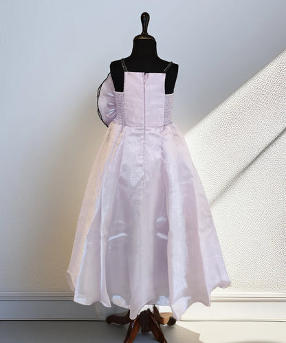 White dress on a mannequin against a light background