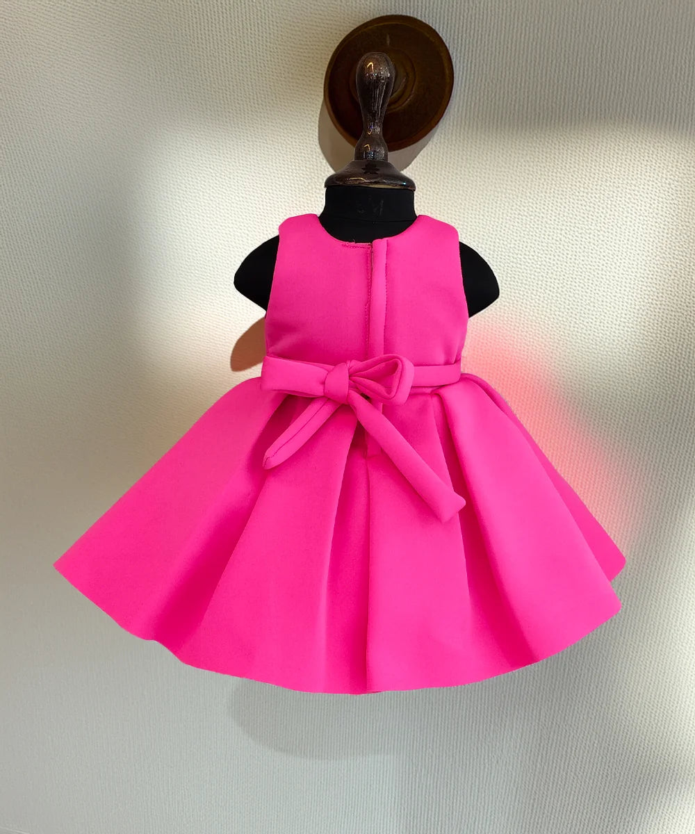 Sleeveless pink party frock for girls, kids clothing store in Jaipur