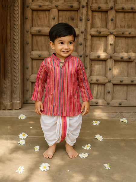 Child wearing a traditional outfit with a wooden door in the background