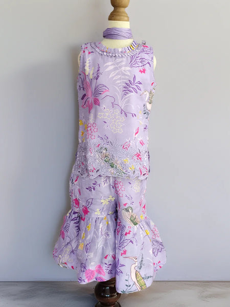 Floral dress on a mannequin against a plain background