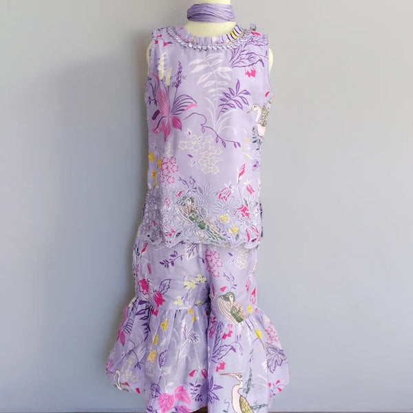 Floral dress on a mannequin against a plain background