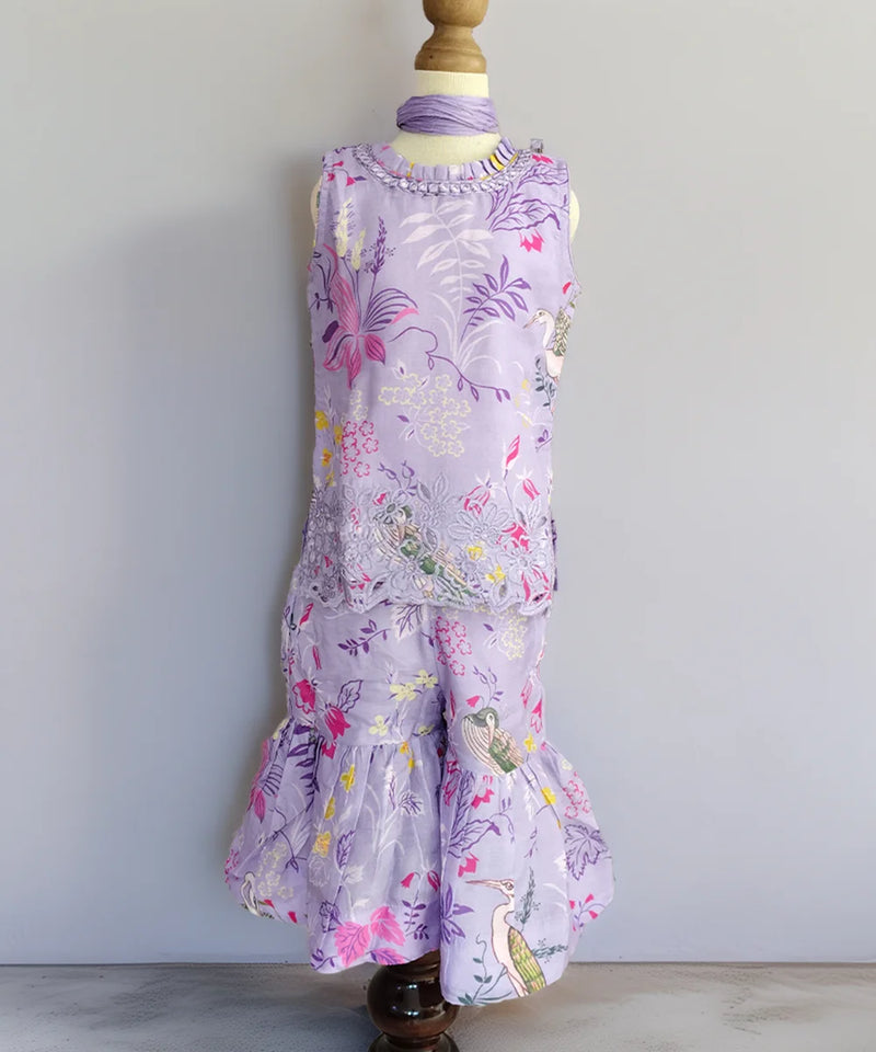 Floral dress on a mannequin against a plain background