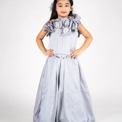 It is a  grey Colored gown paired up with a metallic Colored belt. It features floral and pleated detailing on the dress.
