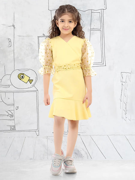 It’s a yellow party dress that comes with a back zip closure. It features polka dots on the sleeves and a matching floral belt.