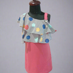 It’s a straight fit pink and grey Colored trendy dresses for kids that comes with a polka-dotted ruffled neck for party looks.  It features a beautiful broach and a back zip closure.