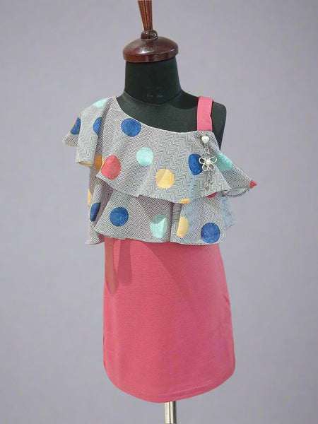 It’s a straight fit pink and grey Colored trendy dresses for kids that comes with a polka-dotted ruffled neck for party looks.  It features a beautiful broach and a back zip closure.