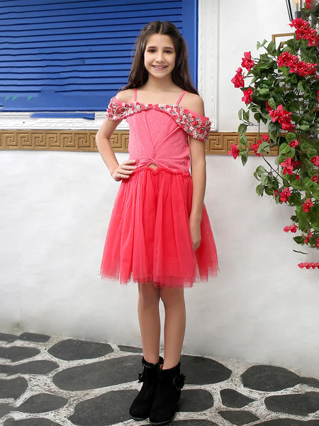 It is a pink-coloured off-shoulder birthday girl frock that comes with a back zip closure. It features beautiful floral and beads detailing on the dress.
