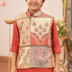 Child wearing a traditional embroidered vest over a red outfit with a decorative background.