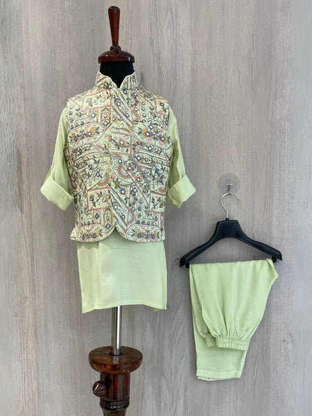  It's a pista green Colored kurta and pyjama teamed up with a beautiful embroidered waistcoat. It is the best boy's designer kurta-pyjama set.