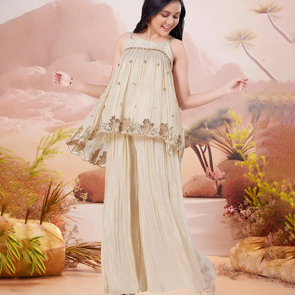 Girl in a beige dress with floral patterns against a desert landscape background