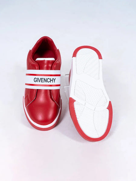 Close-up of girls' fashion red sneakers with white band and flexible sole, Jaipur

