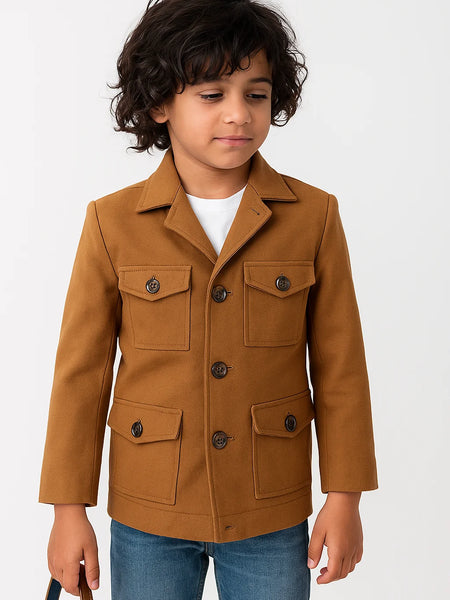 Child wearing a brown jacket with a white background