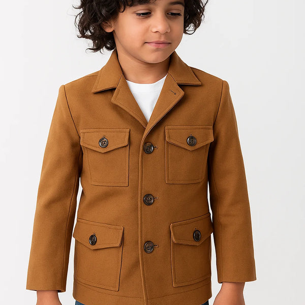 Child wearing a brown jacket with a white background
