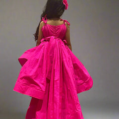 Girl dress party wear in neon pink taffeta, stylish up-and-down silhouette