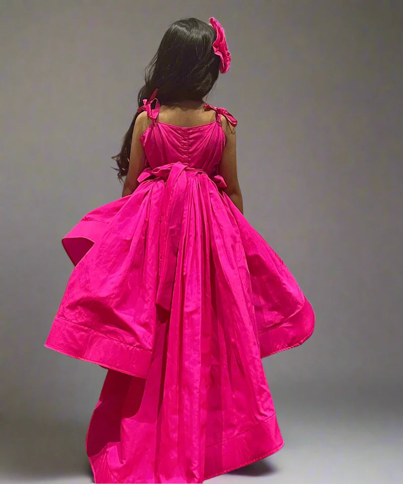 Girl dress party wear in neon pink taffeta, stylish up-and-down silhouette