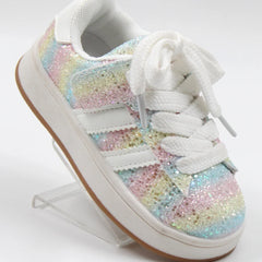 Multicolored sequin sneaker on a white background