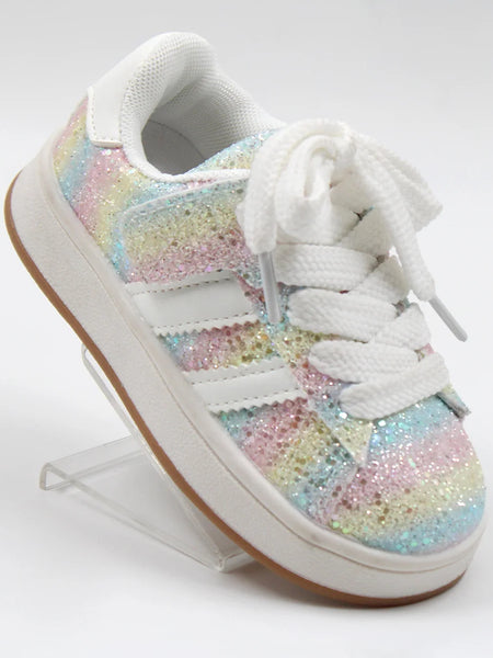 Multicolored sequin sneaker on a white background