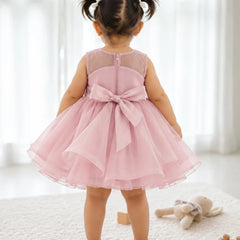 Dusty pink top with sheer neck on baby girl frock