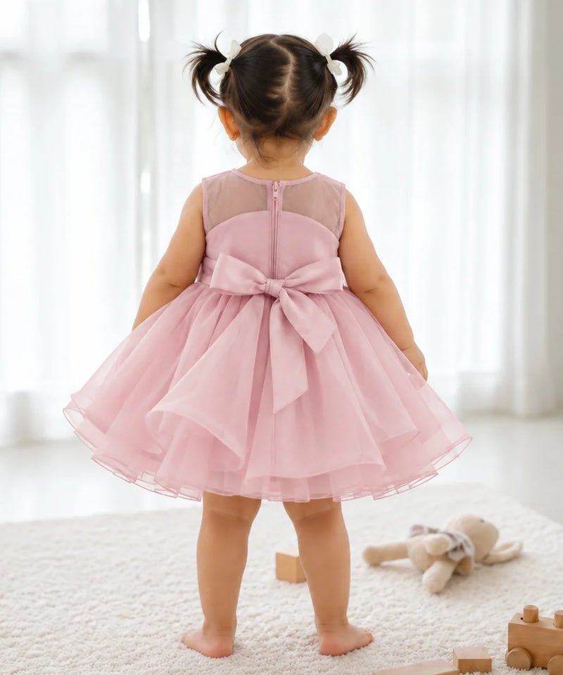 Dusty pink top with sheer neck on baby girl frock