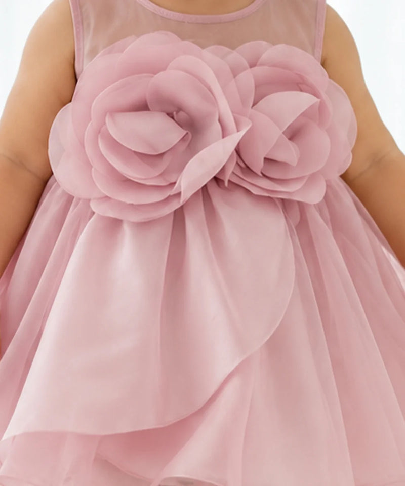 Fluffy layered pink net skirt with full flare on baby girl frock