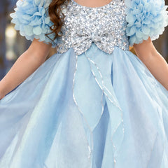 Ice-blue flared skirt with petal-shaped front detailing on girl party frock