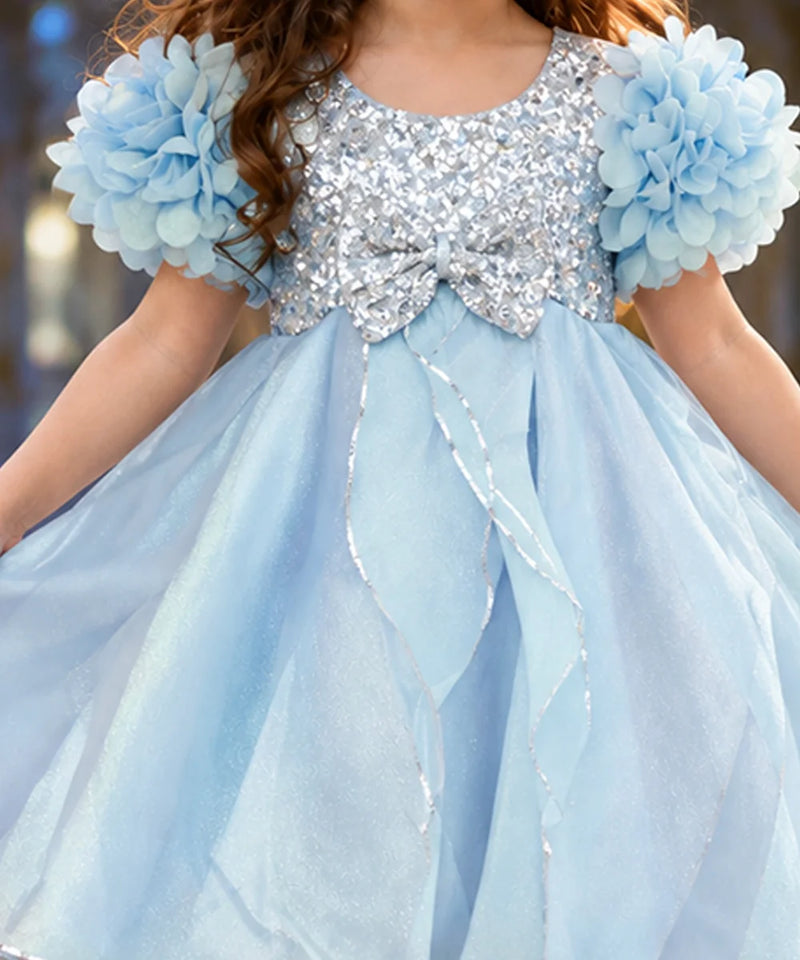 Ice-blue flared skirt with petal-shaped front detailing on girl party frock