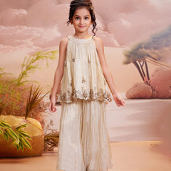 Cream palazzo set for girls with embellished sleeveless top and wide-leg pants, Jaipur wedding style

