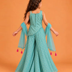 Wide flared sea green sharara pants decorated with tiny golden star print motifs.   