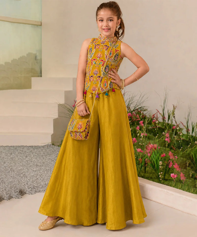 Young Girl wearing mustard sharara top with slinf with style