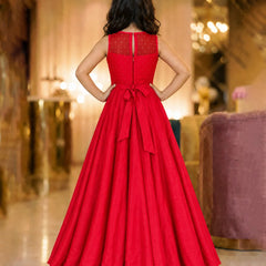 Back view of girls' red silk party gown with gold embroidery