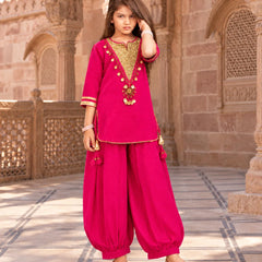 Fuchsia pink girls kurta with gold decorative borders on sleeves