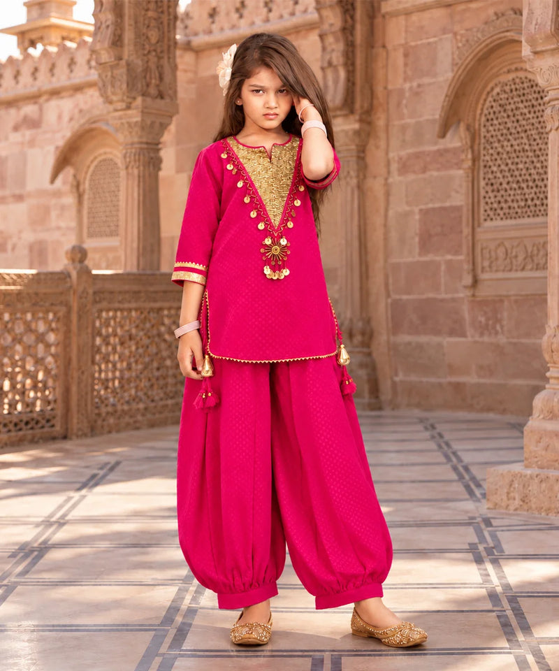 Fuchsia pink girls kurta with gold decorative borders on sleeves
