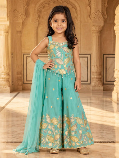 Girls' sea green embroidered sharara set with gold leaf work, bead tassels and sheer dupatta by Devils N Angels Jaipur