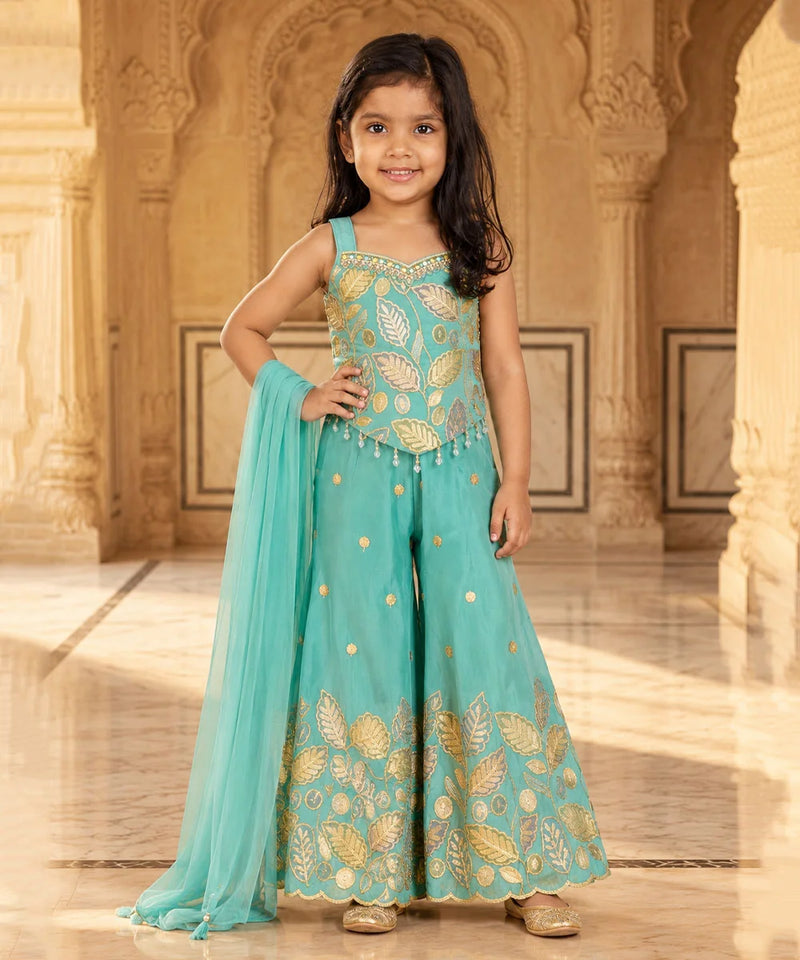 Girls' sea green embroidered sharara set with gold leaf work, bead tassels and sheer dupatta by Devils N Angels Jaipur