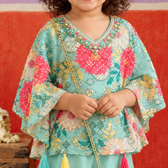 Flared kaftan sleeves with colorful floral motifs.   