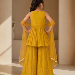 Mustard yellow sleeveless kurta with matching sharara and dupatta.