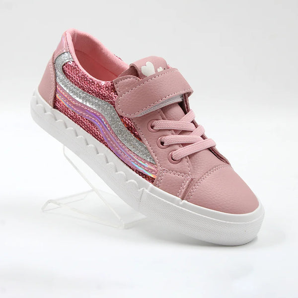 Pink children's sneaker with a white sole on a light gray background