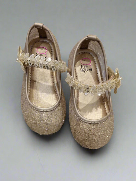Elegant gold party shoes for girls featuring butterfly accent and sparkling finish, Jaipur
