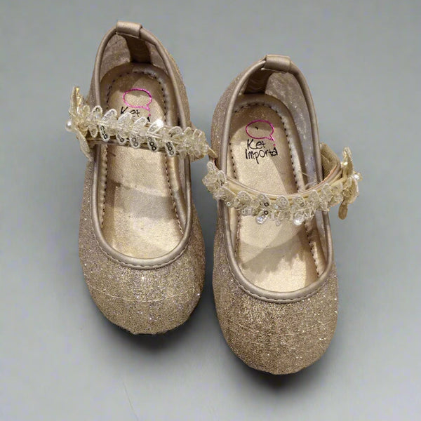 Elegant gold party shoes for girls featuring butterfly accent and sparkling finish, Jaipur