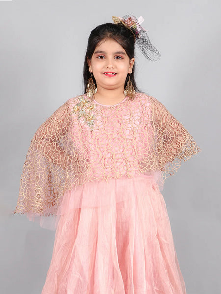 This light pink gown is paired up with a fancy golden Colored cape and comes with a back zip closure. It features embroidered detailing on the cape and fabric belt to be tied at the back.
