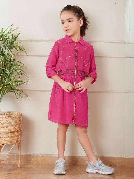  It’s a pink coloured fancy girl dress for a party with an elasticated waist. It features beautiful golden work and chain detailing on the dress.