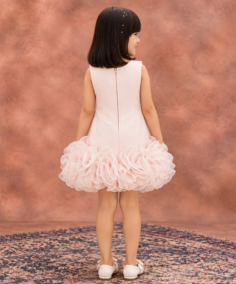 Back view of baby girls' light pink ruffle frock