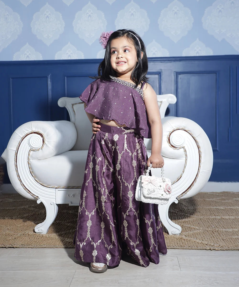 Girls' purple embellished sharara set with one-shoulder ruffle top and flared pants, Jaipur