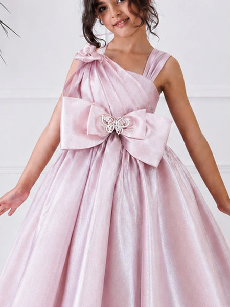 Pink dress with a large bow and butterfly detail on a white background