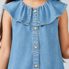 A close-up of a child wearing a light blue denim sleeveless top with a large ruffled collar and gold-tone buttons down the front.