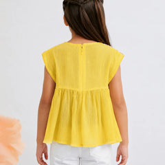 A child model shown from the back wearing a bright yellow sleeveless peplum top and white pants against a plain light gray background.